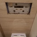 Usługa hydrauliczna polegająca na naprawie spłuczki podtynkowej WC