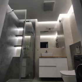 Usługa montażu oświetlenia w łazience w w ramach usługi elektrycznej